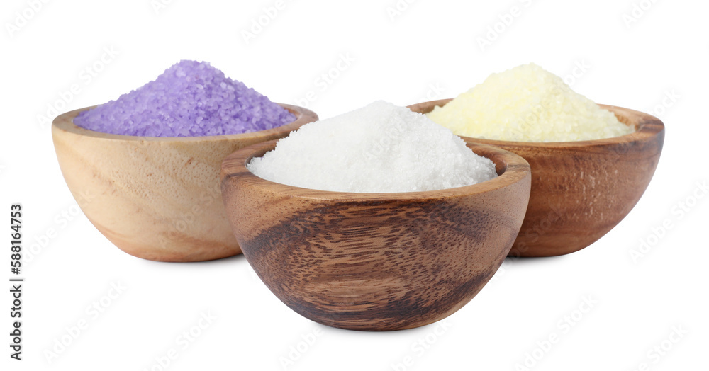Wooden bowls with different sea salt on white background