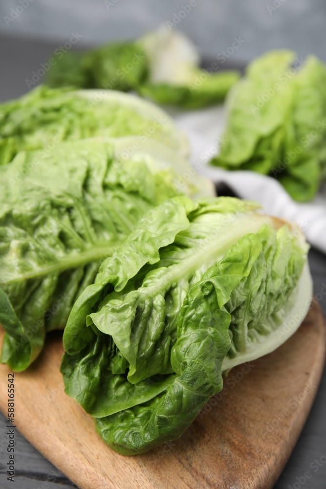 Fresh green romaine lettuces on grey wooden table, closeup Fresh green romaine lettuces on grey wooden table, closeup