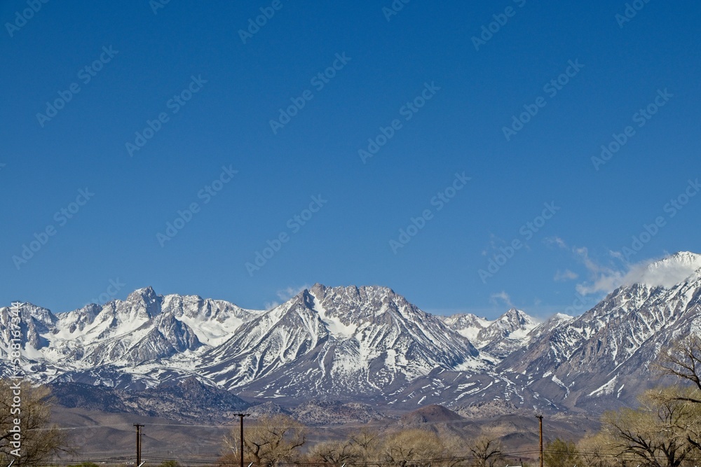 Large amounts of snow top the Sierra Nevada Mountains viewed from California's Eastern Sierra region