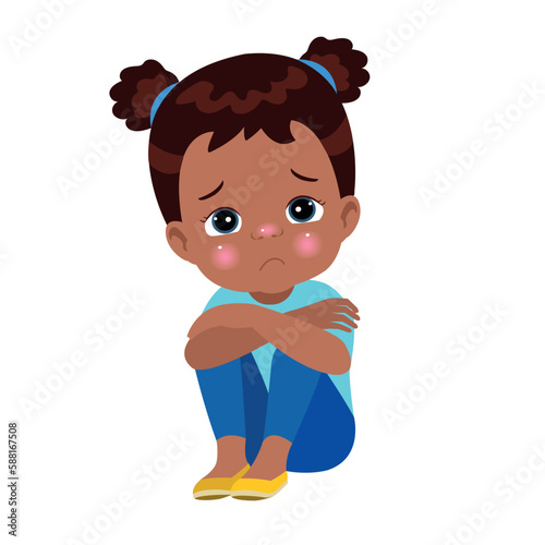 unhappy boy sitting with hands on knees