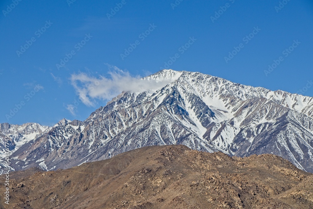 Large amounts of snow top the Sierra Nevada Mountains viewed from California's Eastern Sierra region