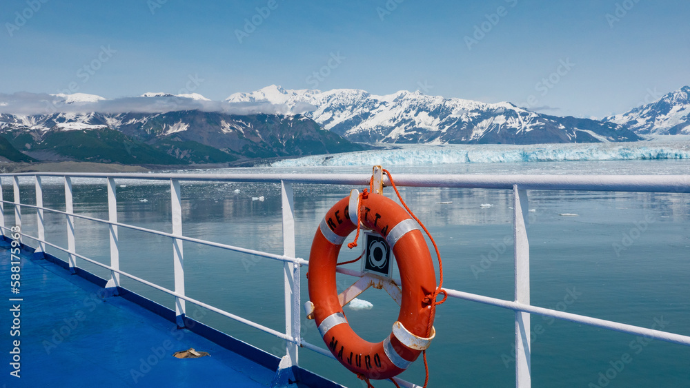 Ring buoy lifebuoy at glacier ship cruise. Alaska glacier cruise travel safety. Red color llifebuoy.