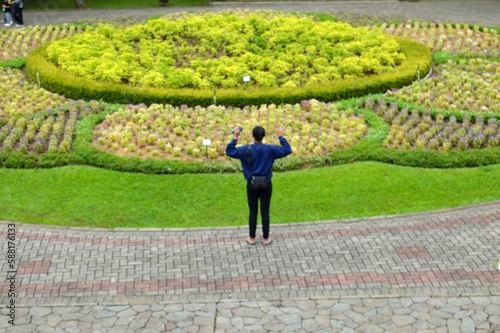 Cianjur, Indonesia – February 23, 2020: Glimpse Of Taman Bunga Nusantara. Sprawling Gardens With Many Flowers, A Large Hedge Maze, Topiary, A Lake & More. Selected Focus photo