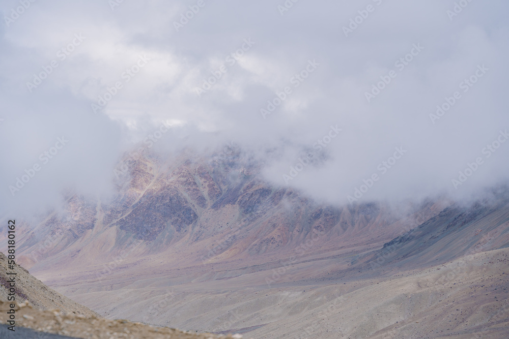 Clouds fly over the top of the mountain, beautiful scenery at Ladakh, India