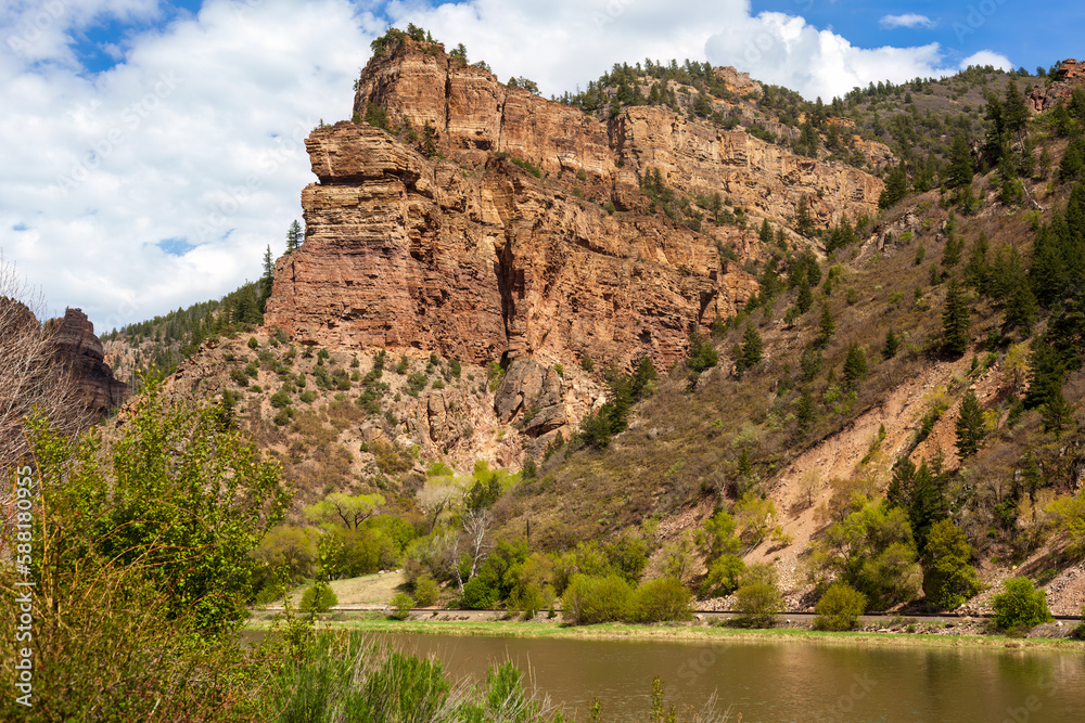 Springtime in Glenwood Canyon with cliffs rising over the Colorado River