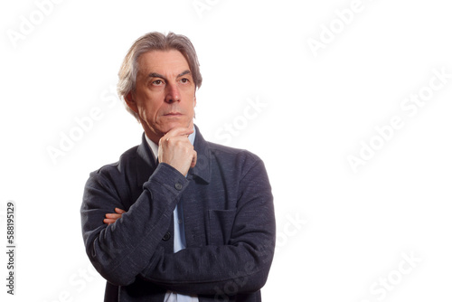 Portrait of a thoughtful elderly man on a white isolated background. © papa