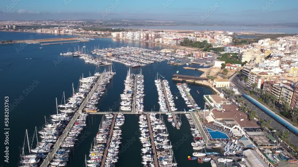 Torrevieja, Spain. Aerial View of City Harbor, Boats in Marina and Promenade Torrevieja, Spain. Aerial View of City Harbor, Boats in Marina and Promenade
