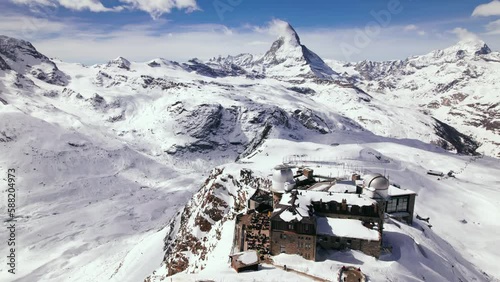 Aerial of Gornergrat on top of swiss alps Matterhorn mountain range in winter photo