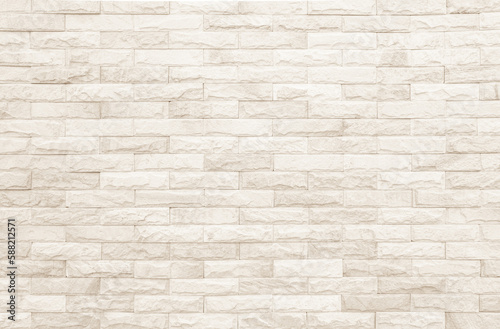 Empty background of wide cream brick wall texture. Beige old brown brick wall concrete or stone textured, wallpaper limestone abstract. 