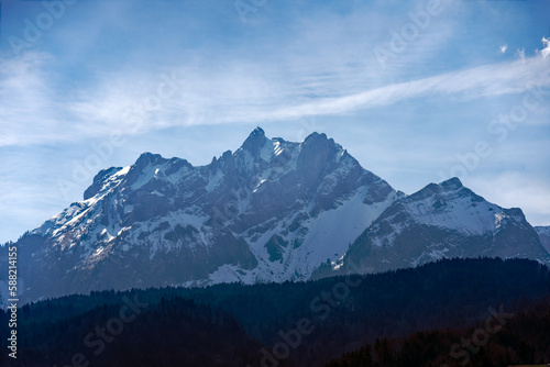 Scenic landscape and Swiss Alps with mount Pilatus seen from City of Emmen, Canton Lucerne, on a sunny spring day. Photo taken March 22nd, 2023, Emmen, Switzerland.