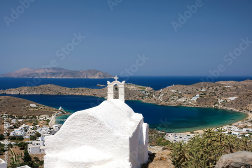 Fototapeta Naklejka Na Ścianę i Meble -  Panoramic view of the aegean sea from the rooftop of a whitewashed orthodox chapel on the island of Ios Greece