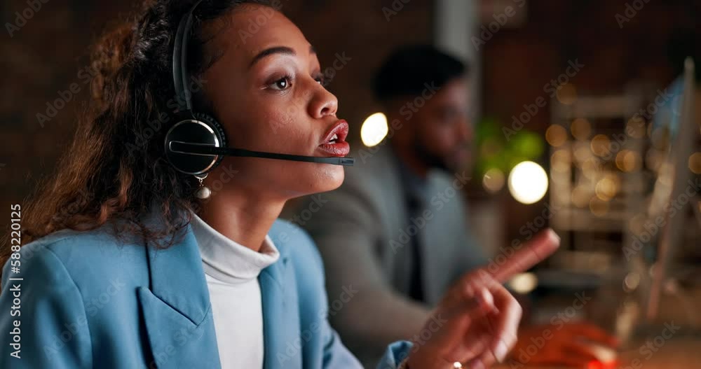 Angry woman, call center and consulting at night with headphones in customer service or support at the office. Frustrated female consultant working late talking to difficult client for online advice