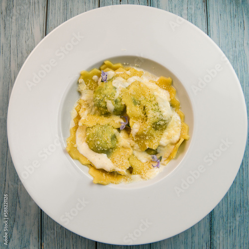 Recipe for Homemade Italian Ravioli pasta with Spinach and Ricotta Filling. High quality photo
