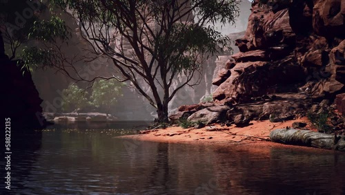 Reflection in Colorado River of Butte catching days last rays, in Grand Canyon. photo