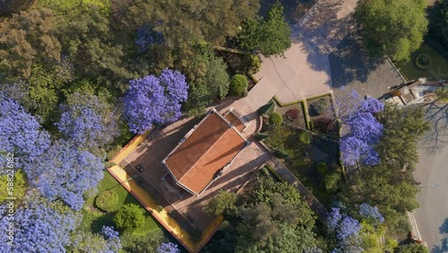 aerial view of cerro de las campanas in queretaro, spring green and blue trees during sunset tourist area important point photo