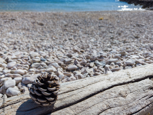 a cone on the beach overlooking the sea