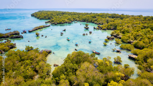 A wooden fishing boat with a traditional design, commonly found in Tanzania and located in the Indian Ocean near Zanzibar.