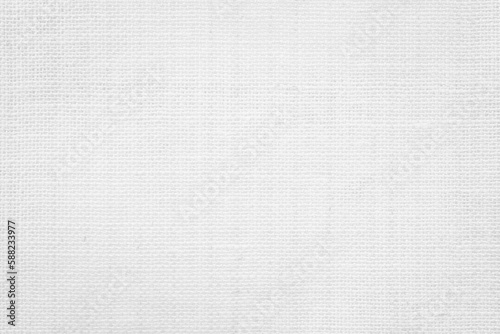 Fabric canvas woven texture background in pattern light white color blank. Natural gauze linen, carpet wool and cotton cloth textile textured as clean empty for decoration text. Grey sack material.