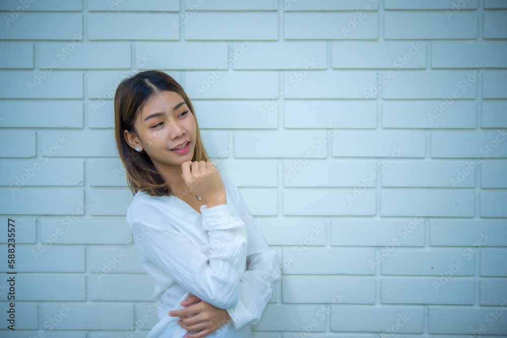 Pretty asian business woman stands confidently with her arms crossed and a smile on her face, Digital marketing. Pretty asian business woman stands confidently with her arms crossed and a smile on her face, Digital marketing.