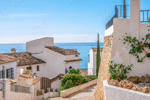Fototapeta Naklejka Na Ścianę i Meble -  Altea old town with narrow streets and whitewashed houses. Architecture in small picturesque village of Altea near Mediterranean sea, Alicante province, Valencian Community, Spain