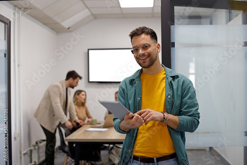 Successful company with happy employees in modern office