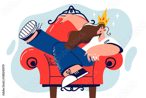 Young woman with crown on head sits in red chair with legs up and behaves selfishly because 