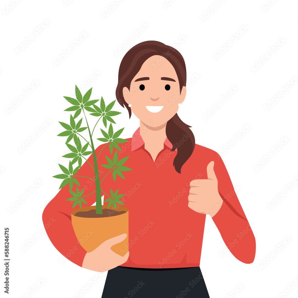 Woman holding cannabis plant in pot and giving thumb up as she is supporting the use of cannabis. Weed or marijuana Woman holding cannabis plant in pot and giving thumb up as she is supporting the use of cannabis. Weed or marijuana