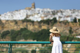 Tourist contemplating spanish town views