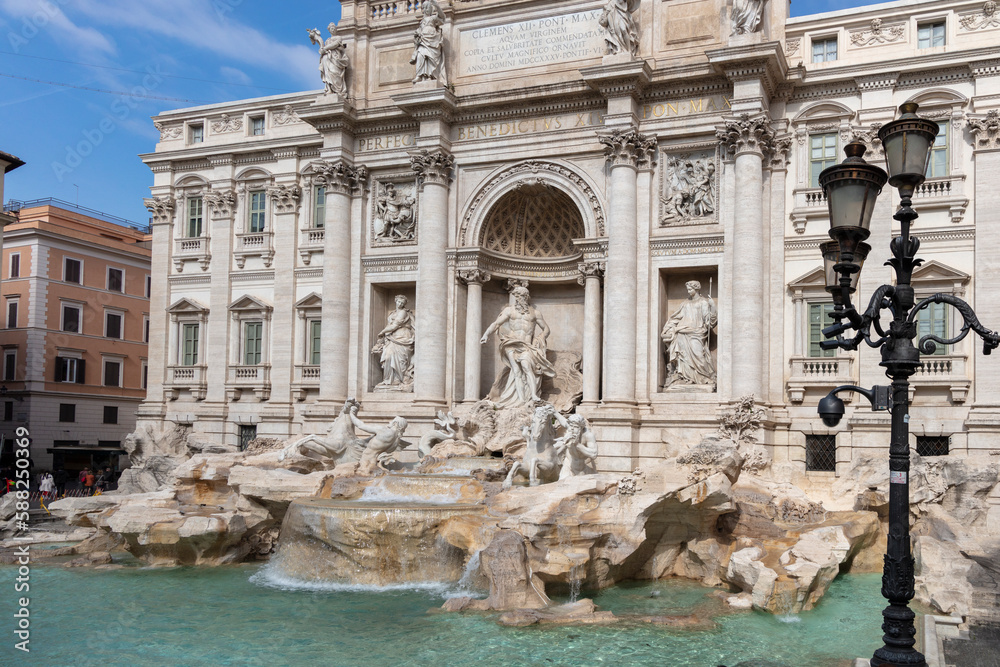 trevi fountain in rome during a summer day