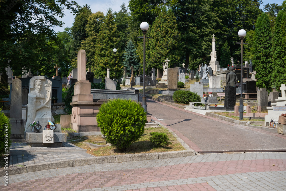 Obraz premium Graves and monuments at Lychakiv Cemetery, Lviv, Ukraine