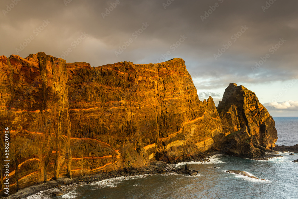 Volcanic cliffs at Atlantic Ocean in Madeira Island, Portugal