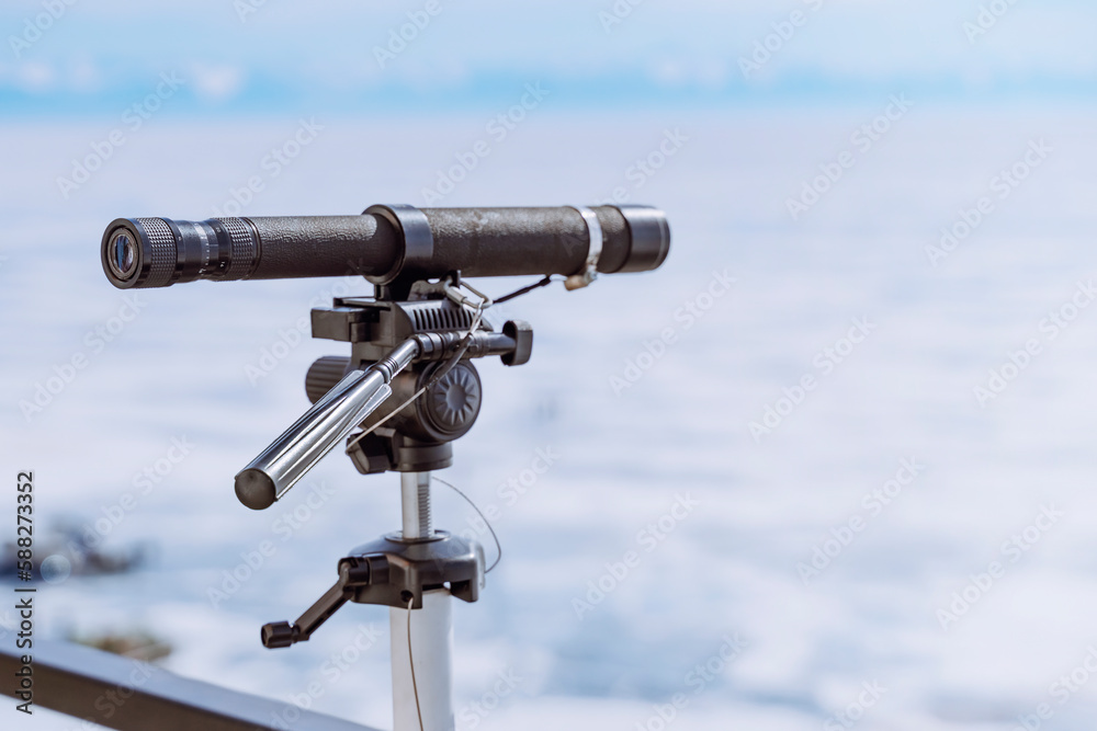 Telescope overlooking the beautiful winterlandscapes of lake Baikal Telescope overlooking the beautiful winterlandscapes of lake Baikal