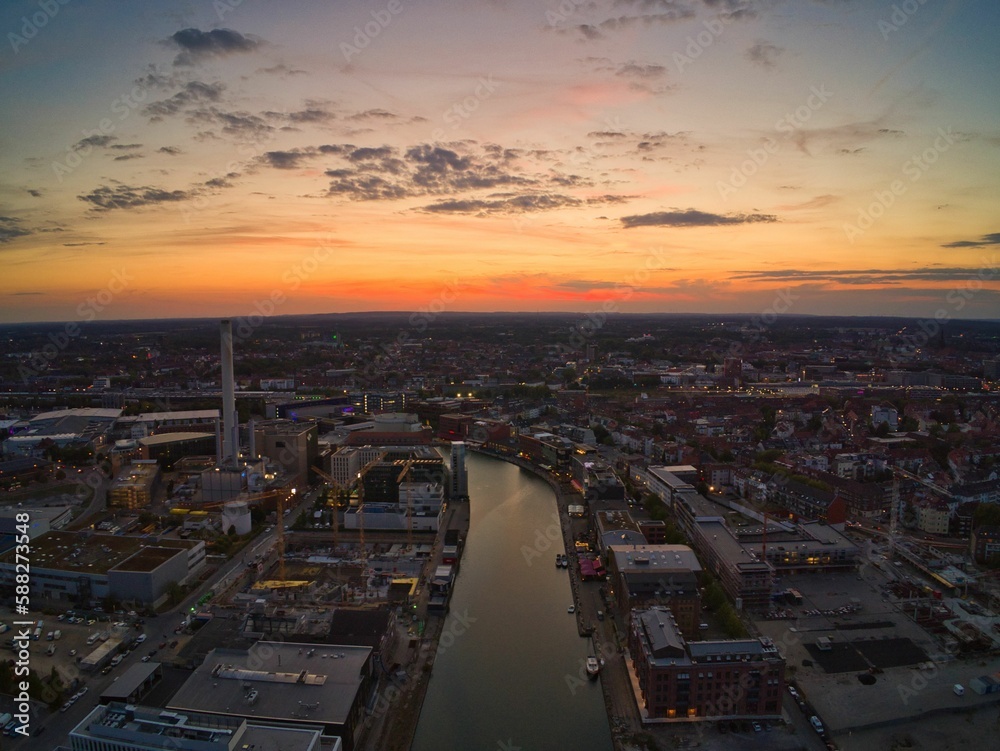 Fototapeta premium Aerial view of the Munster harbor at sunset in Munster, Germany.