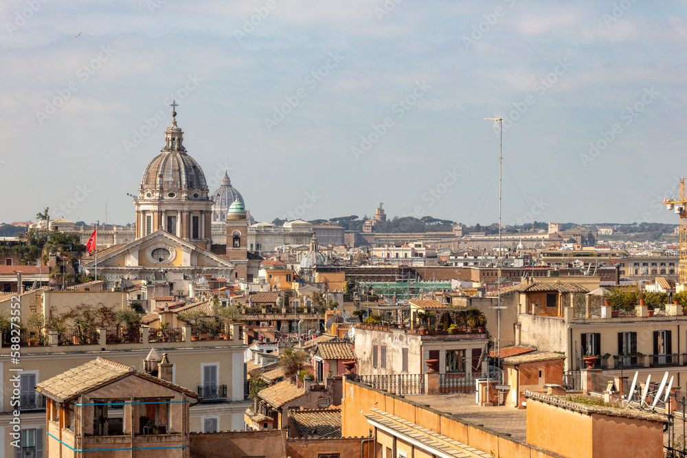 Fototapeta premium Panoramic view of Rome, Italy, from above towards Vatican City with St. Peter's Basilica in the background.
