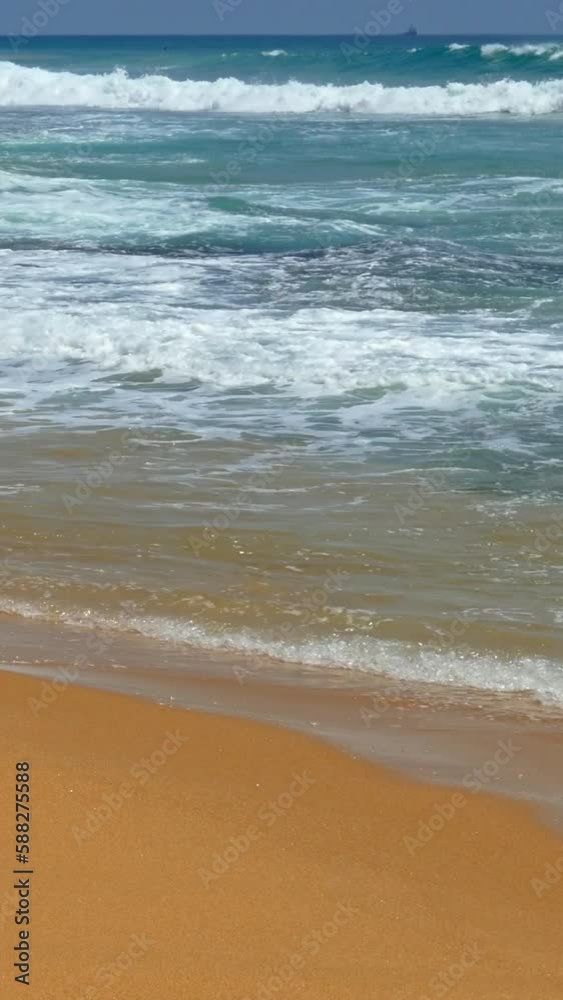 Landscape with ocean waves on the tropical beach. Vertical video Landscape with ocean waves on the tropical beach. Vertical video