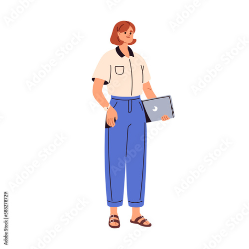 Young business woman with laptop in hands. Happy modern businesswoman standin...