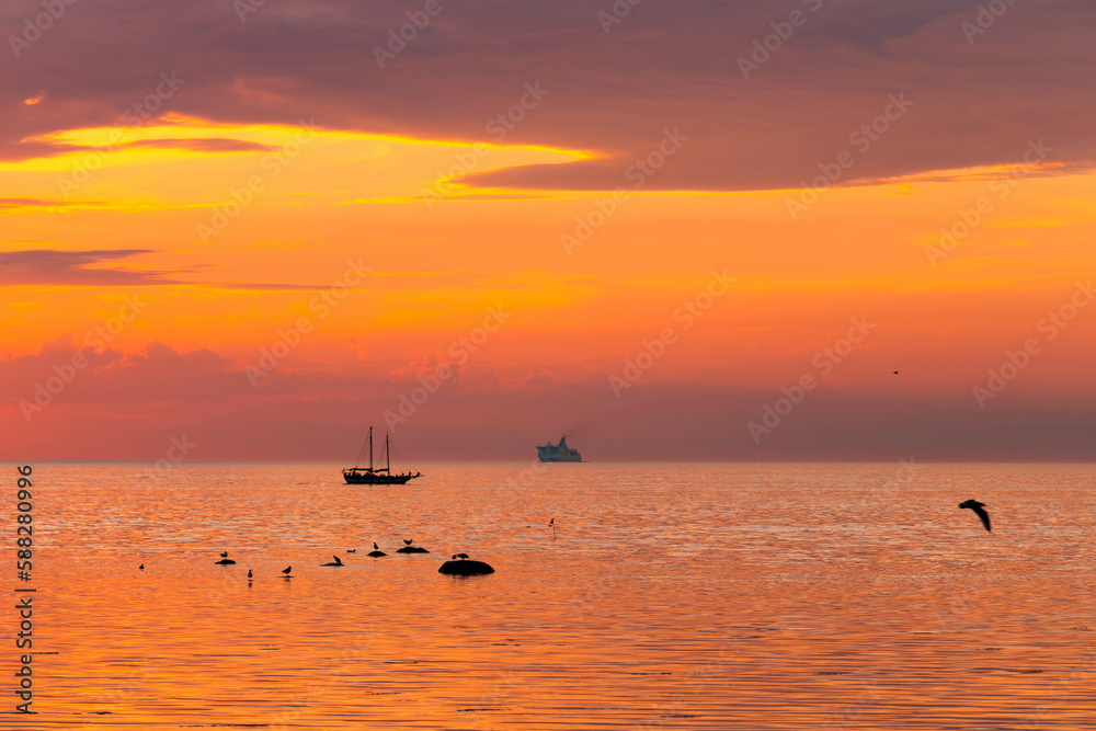 Fototapeta premium tall ship sailing along skyline
