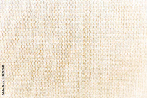 Texture of light beige natural wallpaper. Modern materials for decoration and interior design. Space for text.