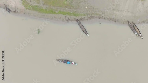 boat in the dirt water top aerial smooth video, Sunamganj, Sylhet, Bangladesh photo