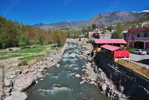 Swat river in the valley of Himalayas, Pakistan photo