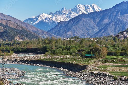 Swat river in the valley of Himalayas, Pakistan photo