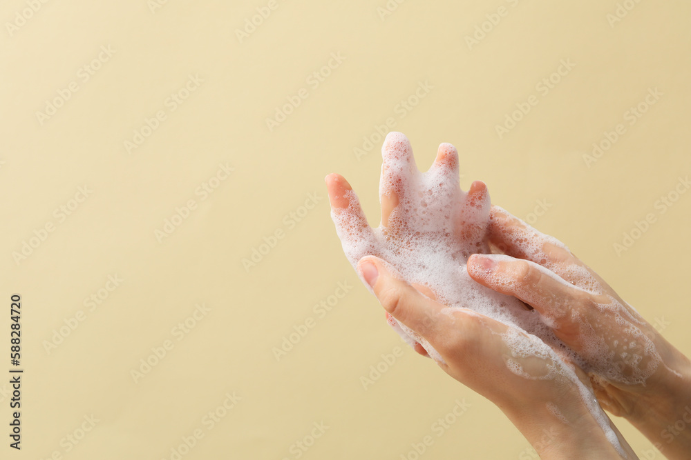 Hands with foam, spa, beauty procedures and skin care concept Hands with foam, spa, beauty procedures and skin care concept