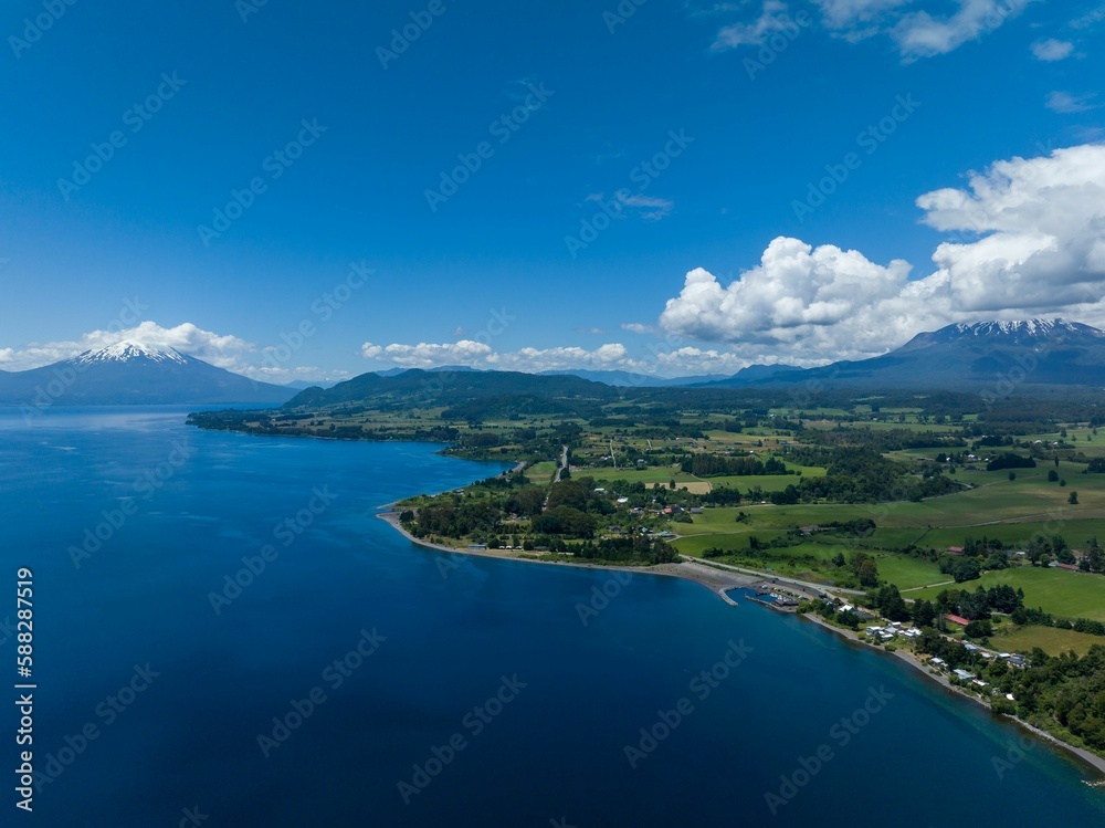 Drone shot of the Calbuco and Osorno Volcanos in Chile with Llanquihue lake on its foot