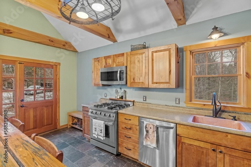 Rustic design kitchen and dining area in an elegant house