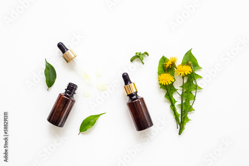 Medical herbs and flowers extract in dropper bottle