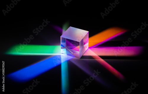 A glass cube reflects many colors. Spectral decomposition of a light ray into colors