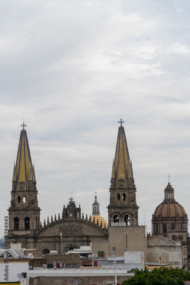 Exterior of Guadalajara Cathedral in Guadalajara, Mexico under cloudy sky
