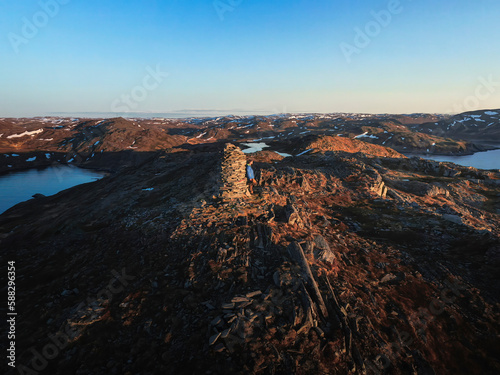 Aerial view of person in Skarsvag trail end, Nordkapp, Finnmark, Norway. photo