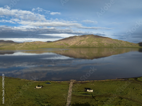 Aerial view of Sheosar lake, Deosai, Gilgit Baltistan, Pakistan in the Karakoram range of the Himalayas. photo