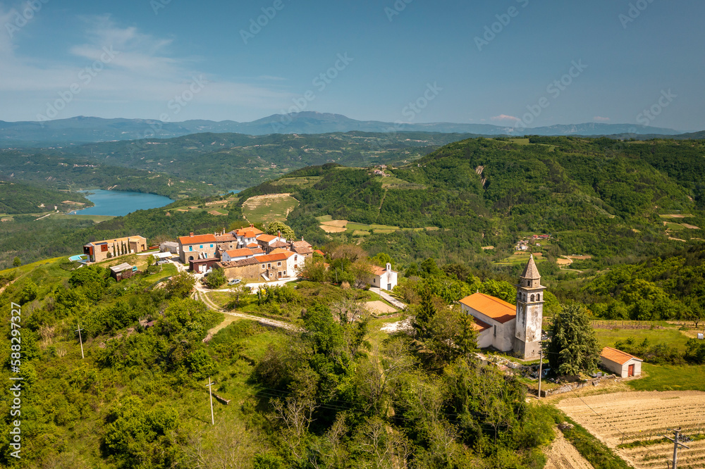 Aerial view of Zamask village with Butonega lake, located in central Istria, Croatia. Aerial view of Zamask village with Butonega lake, located in central Istria, Croatia.